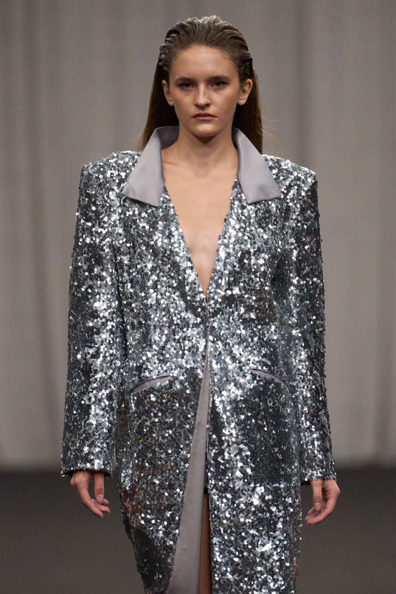 Lili Blanc sequin longline coat with shimmering embellishments and tailored fit, stylish outerwear for a chic look.