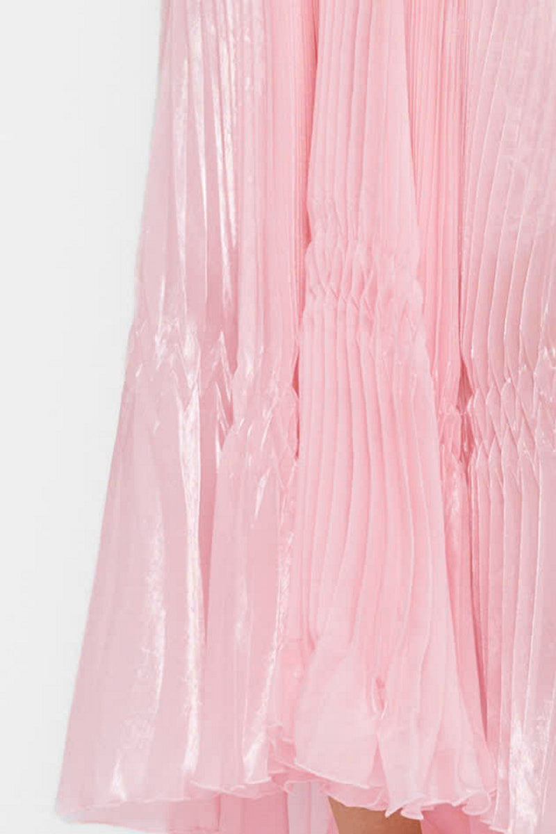 Pastel pink strapless pleated maxi dress by Valenciani featuring a flowing design and elegant length, perfect for formal occasions.