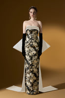 Elegant Versailles jacquard and taffeta gown by I.H.F featuring intricate patterns and flowing fabric, perfect for formal occasions.