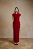 Elegant velvet gown by Arti Apparel featuring a flowing design and rich texture, perfect for formal occasions.
