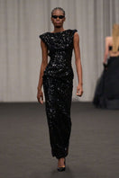 Lili Blanc sculpted sequin gown featuring a fitted silhouette and shimmering embellishments, elegant evening wear for formal occasions.