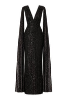 Nur Karaata Giovana gown displayed in soft fabric with elegant design, featuring a flowing silhouette perfect for formal occasions.
