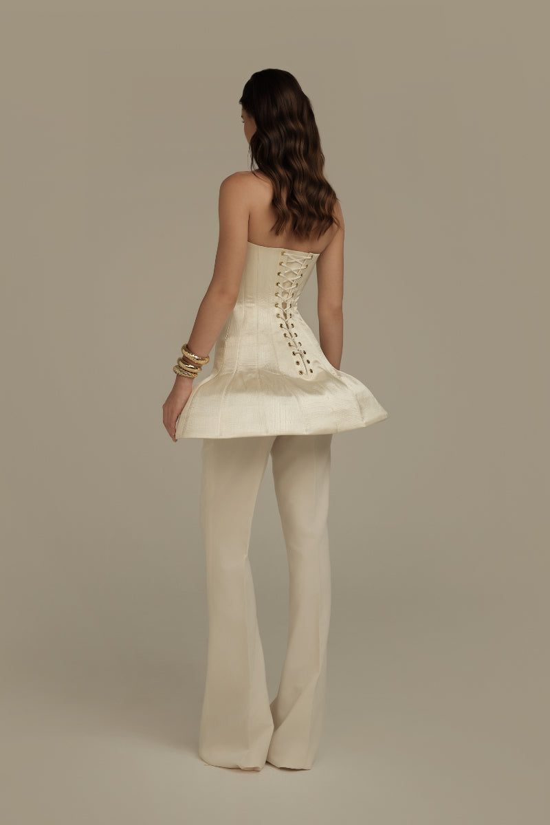 Cream white Lunaria dress top by POEM, featuring soft fabric and elegant design, shown on a model.