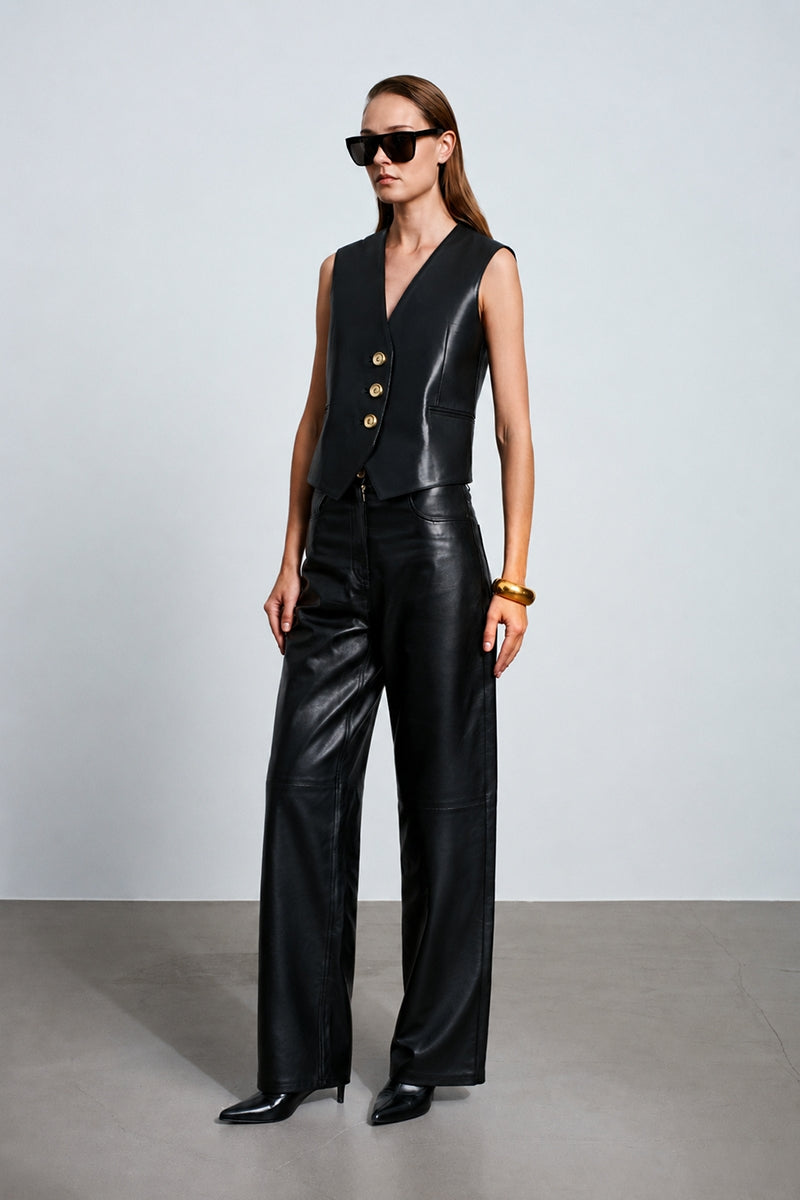 Black Ancient Poem vest by Acaria Studio featuring intricate embroidery and a slim fit design, displayed on a mannequin.
