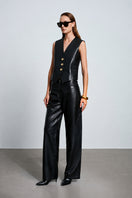 Black Ancient Poem vest by Acaria Studio featuring intricate embroidery and a slim fit design, displayed on a mannequin.