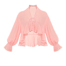 OvertheSea pink splash blouse, stylish women's top with vibrant design, shown on a model.