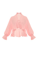 OvertheSea pink splash blouse, stylish women's top with vibrant design, shown on a model.