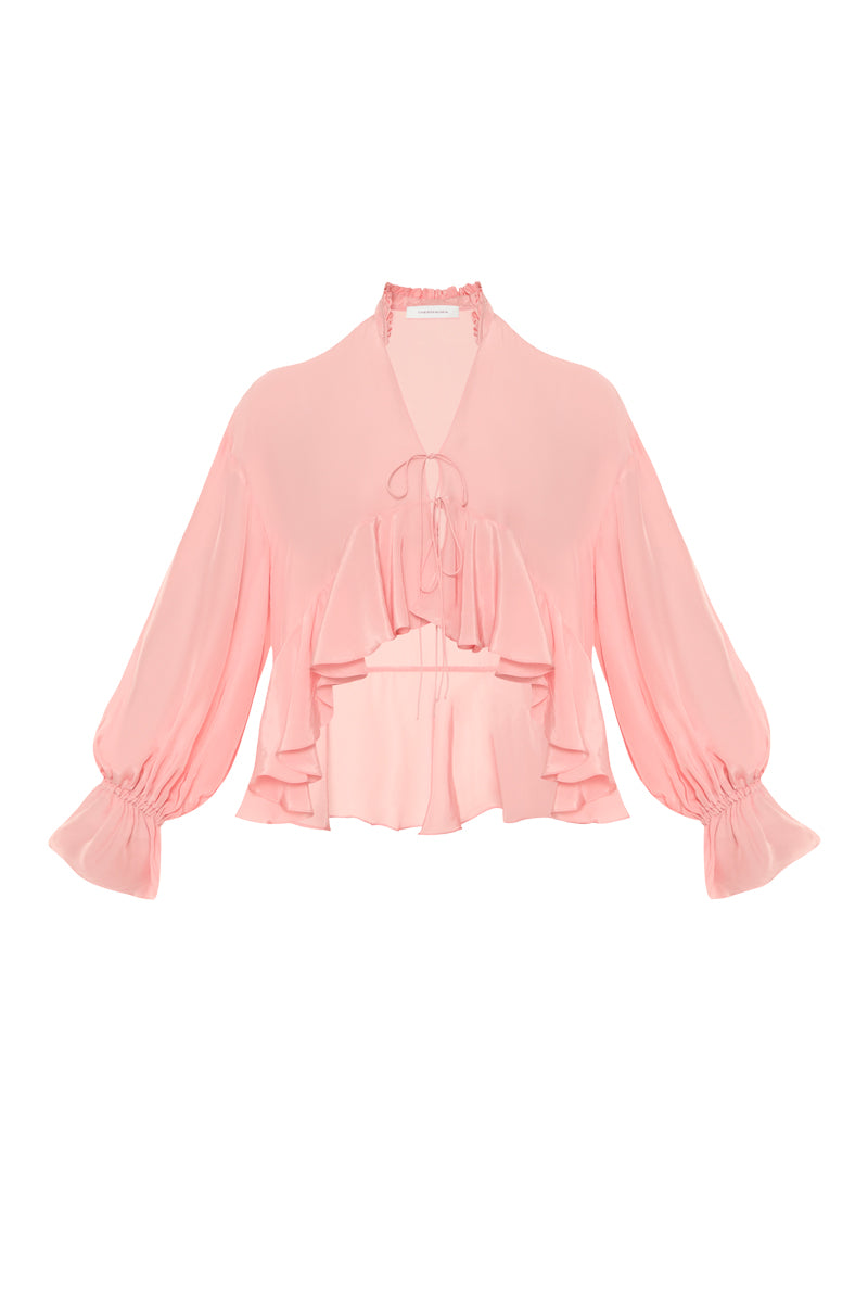 OvertheSea pink splash blouse, stylish women's top with vibrant design, shown on a model.
