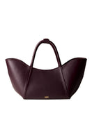 Rose de Mai Neroli Bag in Burgundy, a stylish top handle bag with smooth leather and elegant gold-tone hardware.