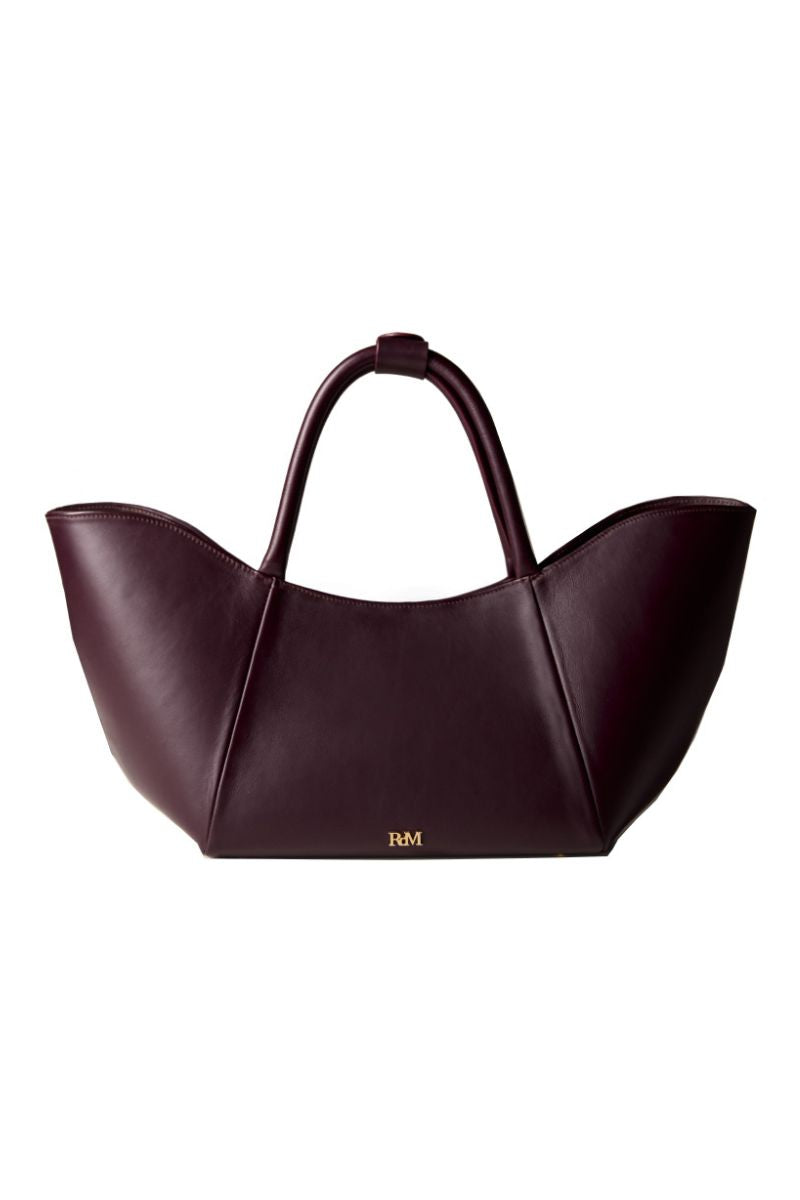 Rose de Mai Neroli Bag in Burgundy, a stylish top handle bag with smooth leather and elegant gold-tone hardware.