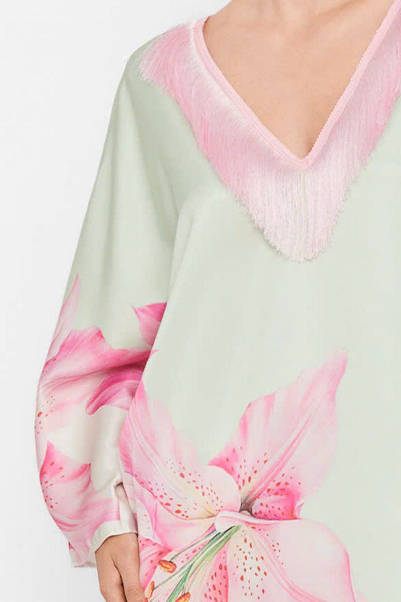 Colorful V-neck midi kaftan dress by Valenciani with a flowing silhouette and multicolor pattern, perfect for casual or beachwear.