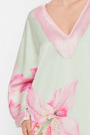 Colorful V-neck midi kaftan dress by Valenciani with a flowing silhouette and multicolor pattern, perfect for casual or beachwear.