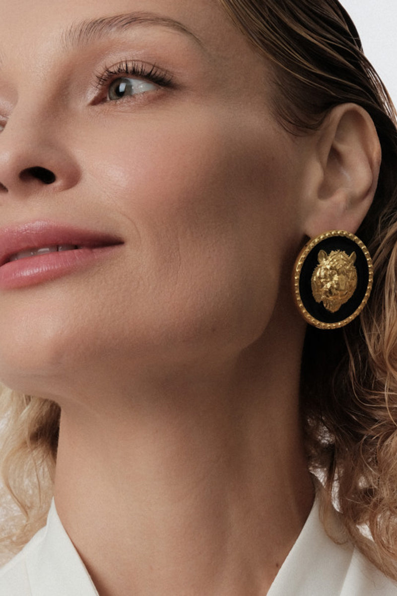 Natia x Lako black lion earrings featuring detailed lion design and silver hooks, stylish jewelry accessory.