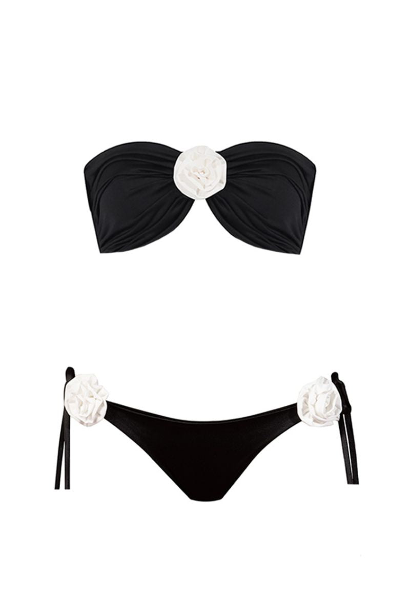 Nur Karaata Grace bikini with colorful floral pattern, triangle top and matching bikini bottoms on a neutral background.
