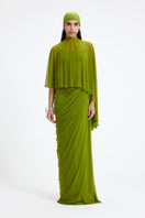 Deme By Gabriella Devon maxi dress in flowing fabric with floral pattern, sleeveless design, and V-neck neckline.