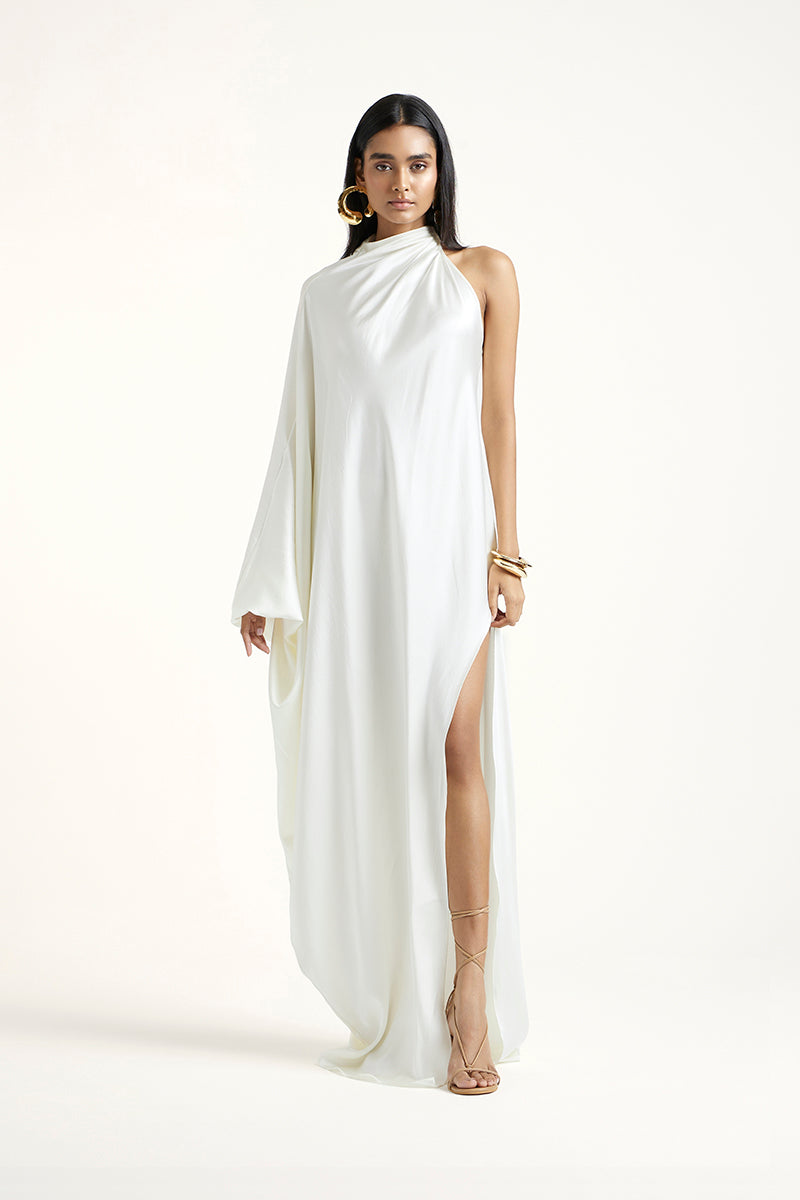 Deme By Gabriella Alice dress in off-white maxi style with flowing fabric and elegant design, perfect for summer occasions.