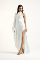 Deme By Gabriella Alice dress in off-white maxi dress with flowing fabric and elegant design, perfect for summer or special occasions.