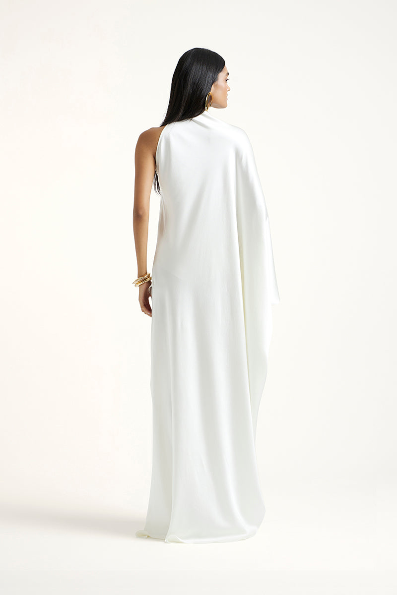 Deme By Gabriella Alice off-white maxi dress with flowing fabric and elegant design, perfect for summer or special occasions.