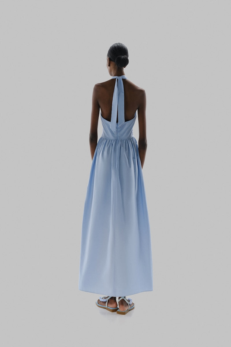 Baobab Agustina maxi dress in vibrant blue fabric, flowing design with soft, elegant fabric perfect for summer wear
