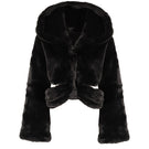 Black hooded fur jacket with cutout details by Kris Marán, showcasing a stylish and cozy outerwear piece.