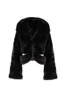 Black hooded fur jacket with cutout details by Kris Marán, showcasing a stylish and cozy outerwear piece.