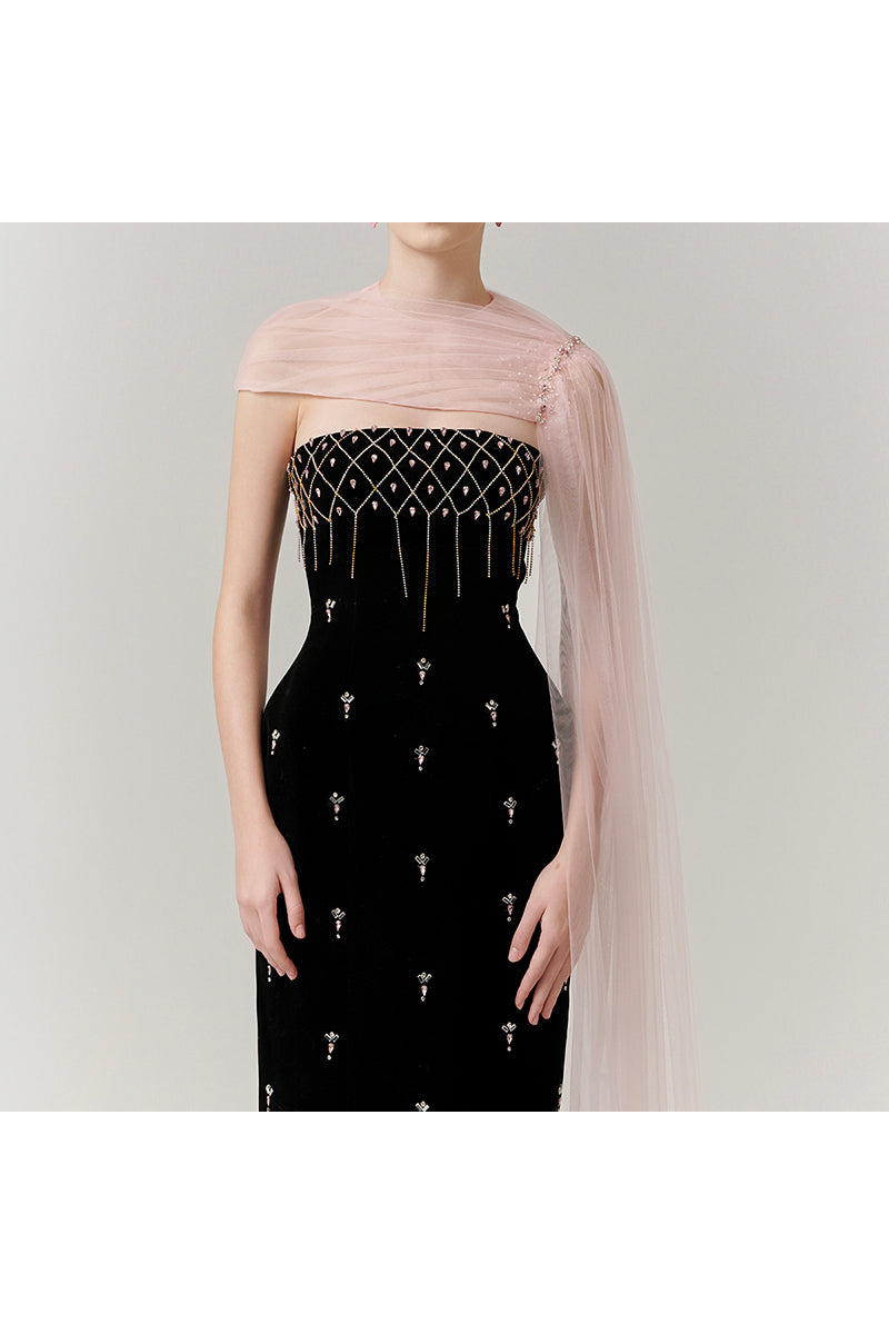 Elegant black velvet crystal body gown with cape by Happy Clothing, featuring intricate crystal embellishments and flowing cape detail.