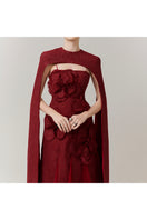 Red Preston Cape Tweed Petal Gown by Happy Clothing, showcasing its elegant design and textured tweed fabric.