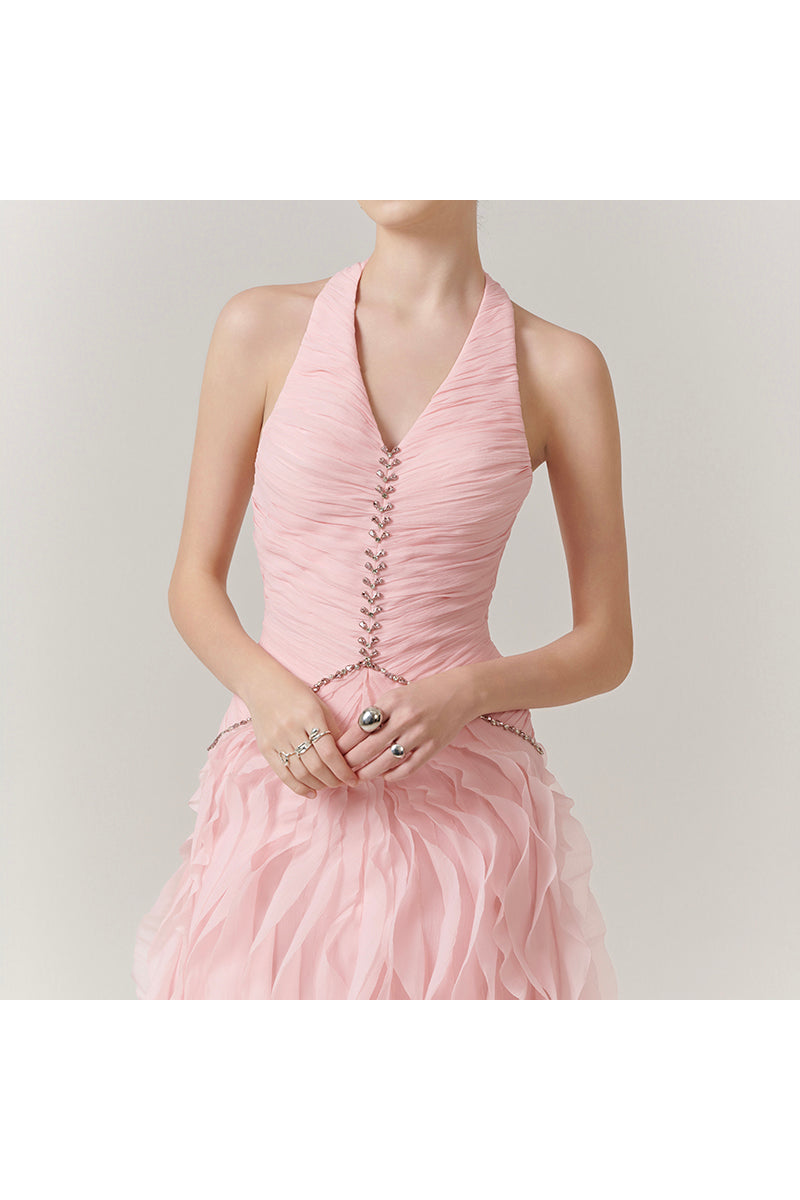 Elegant blush cascade halter gown by Happy Clothing featuring flowing fabric and a stylish halter neckline.