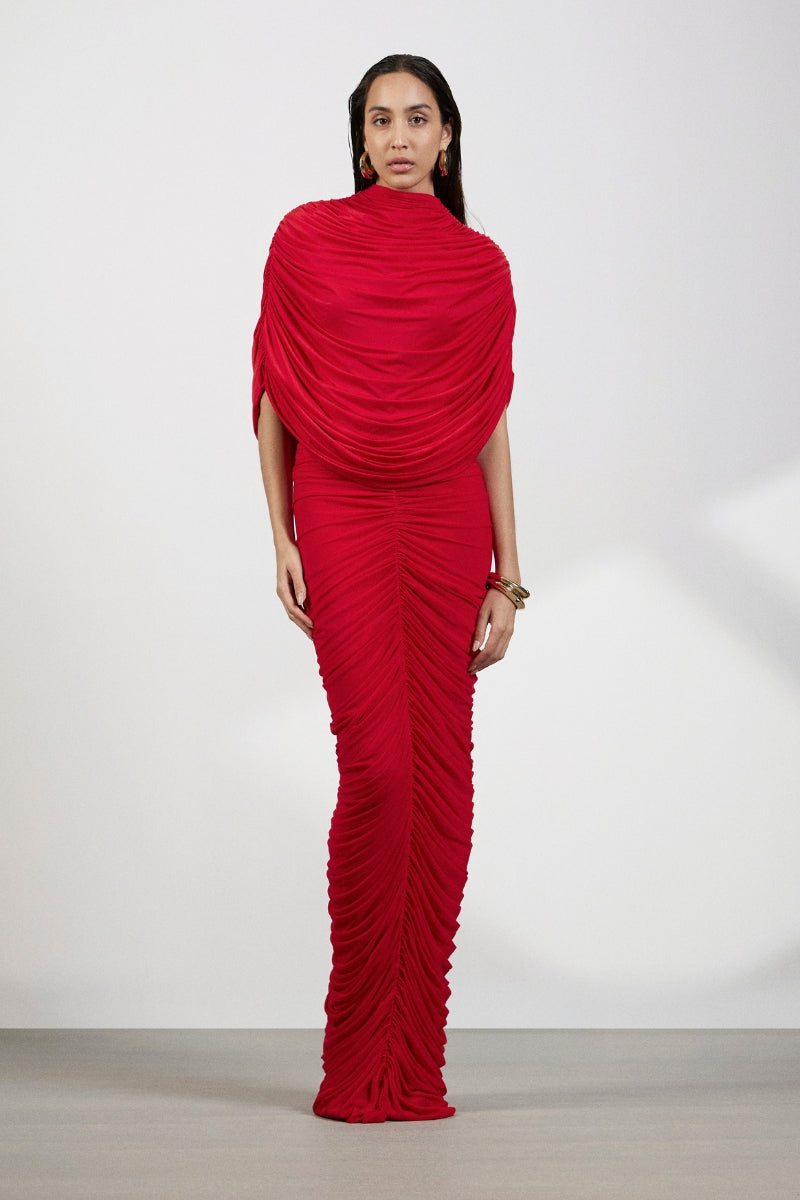 Deme By Gabriella Vienna maxi dress in flowing fabric with a fitted bodice and full-length skirt, perfect for elegant occasions.