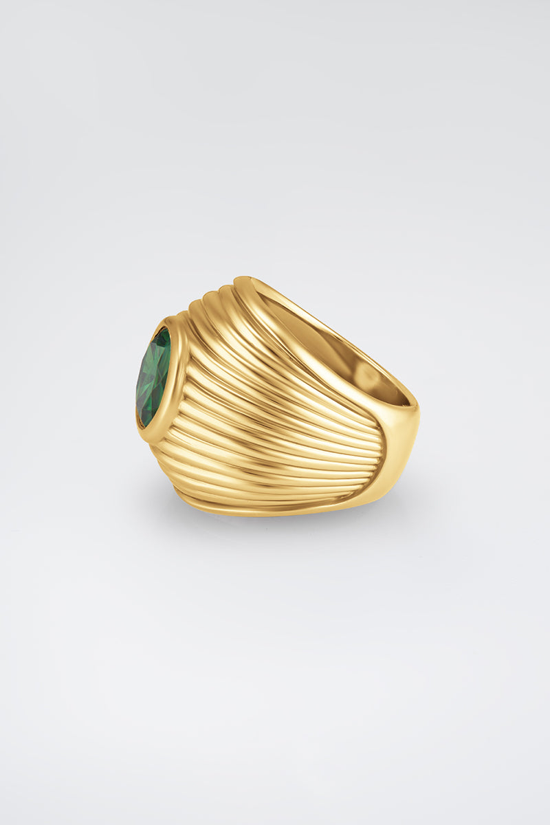 Gold Candy Ring by Poché featuring a sleek, modern design with a shiny gold finish and smooth, rounded shape.