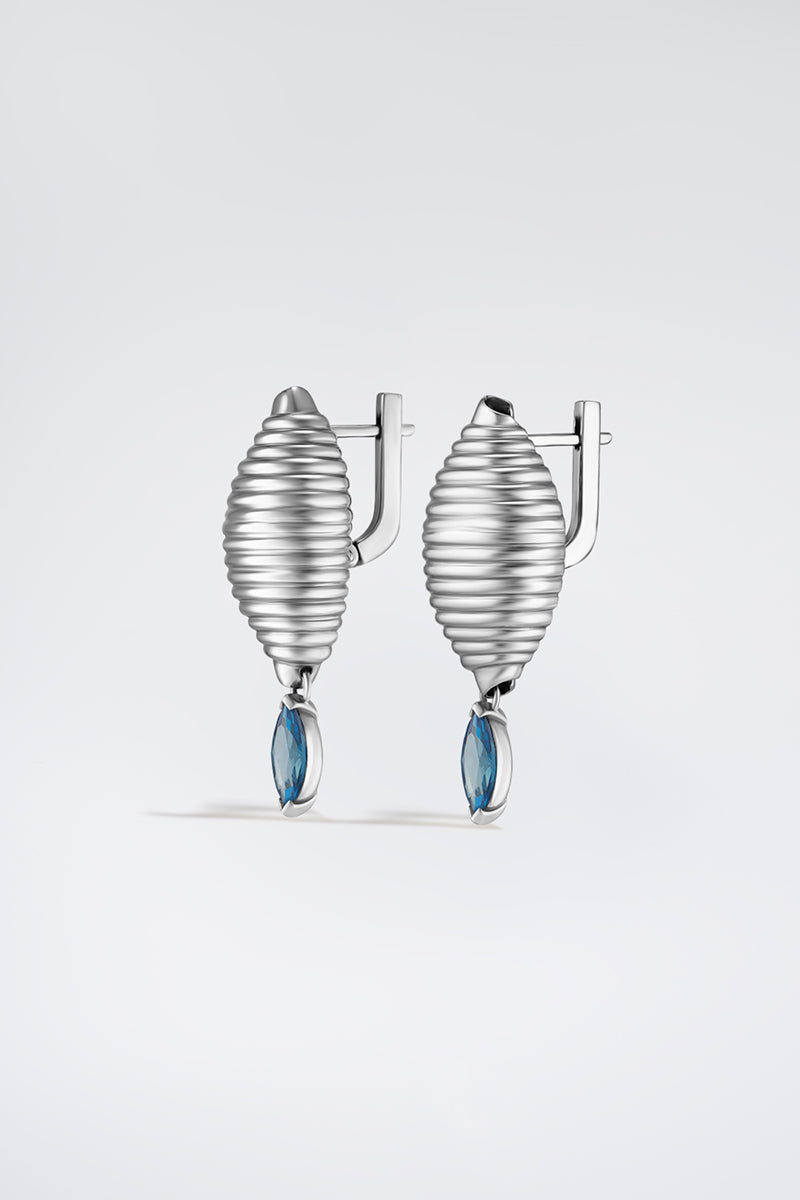 Silver Candy Earrings by Poché featuring colorful, playful candy-shaped charms hanging from sleek silver hooks.
