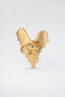 Gold leaf-shaped ring from Poché, featuring a delicate design perfect for elegant jewelry collection.