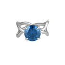 Silver Thorn Ring by Poché featuring a sleek band with a prominent thorn-inspired design.
