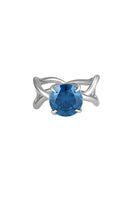 Silver Thorn Ring by Poché featuring a sleek band with a prominent thorn-inspired design.