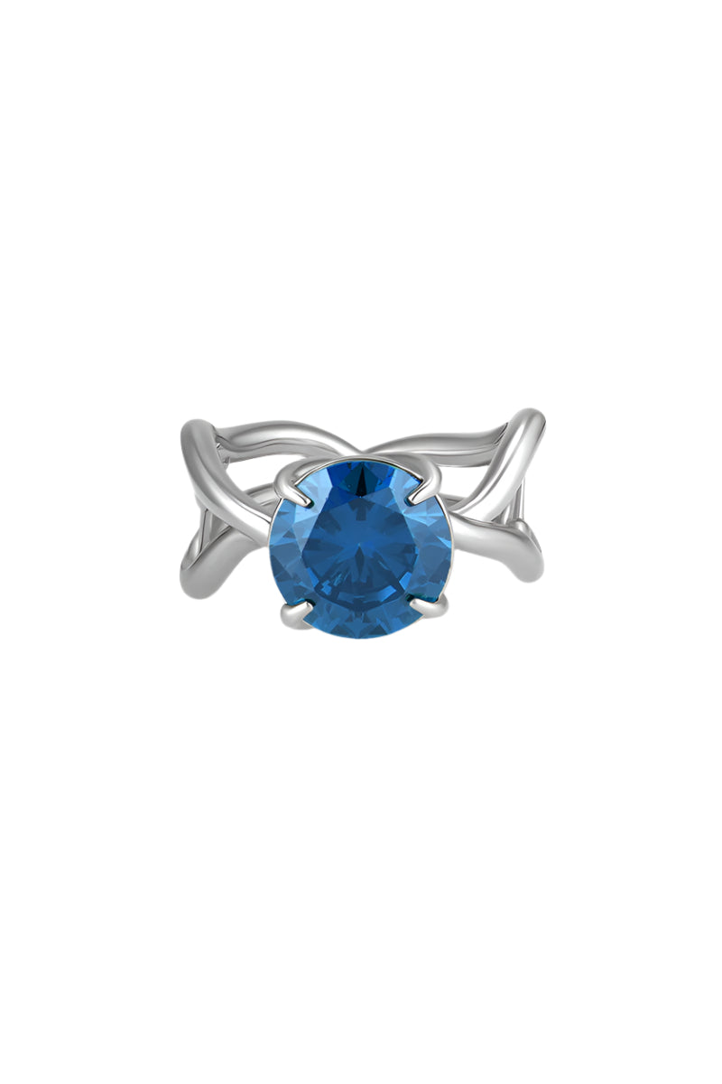 Silver Thorn Ring by Poché featuring a sleek band with a prominent thorn-inspired design.