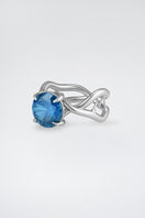 Silver Thorn Ring by Poché featuring a sleek band with a detailed thorn design, perfect for modern jewelry styles.