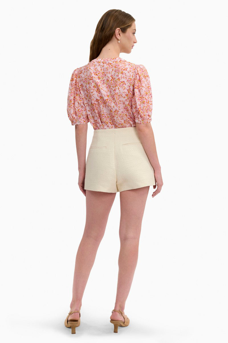 Rebecca Taylor Margot Tweed Shorts in cream, high-waisted with a tailored fit, shown on a model against a neutral background.