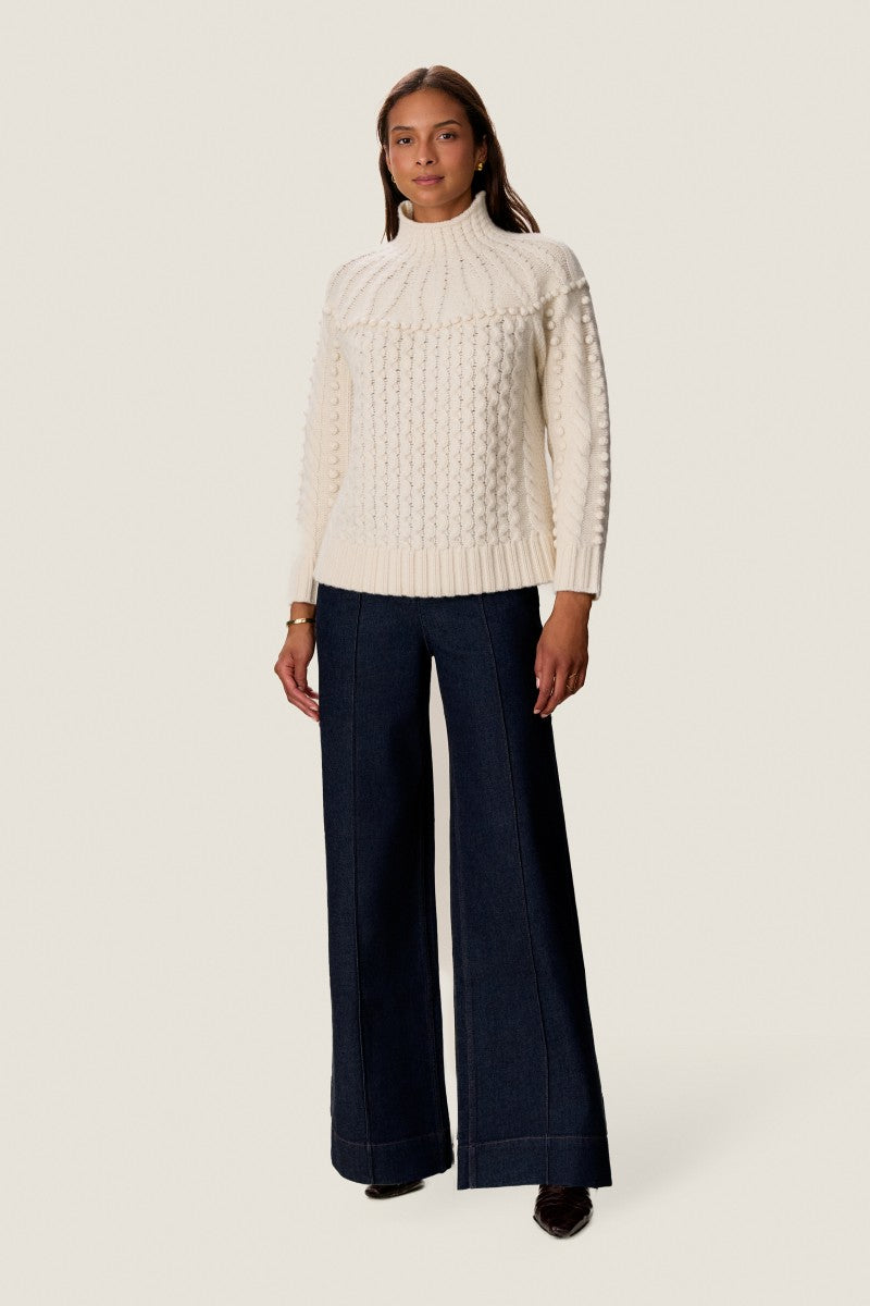 Rebecca Taylor Raven turtleneck sweater in soft knit fabric, close-up of the fitted collar and textured design.