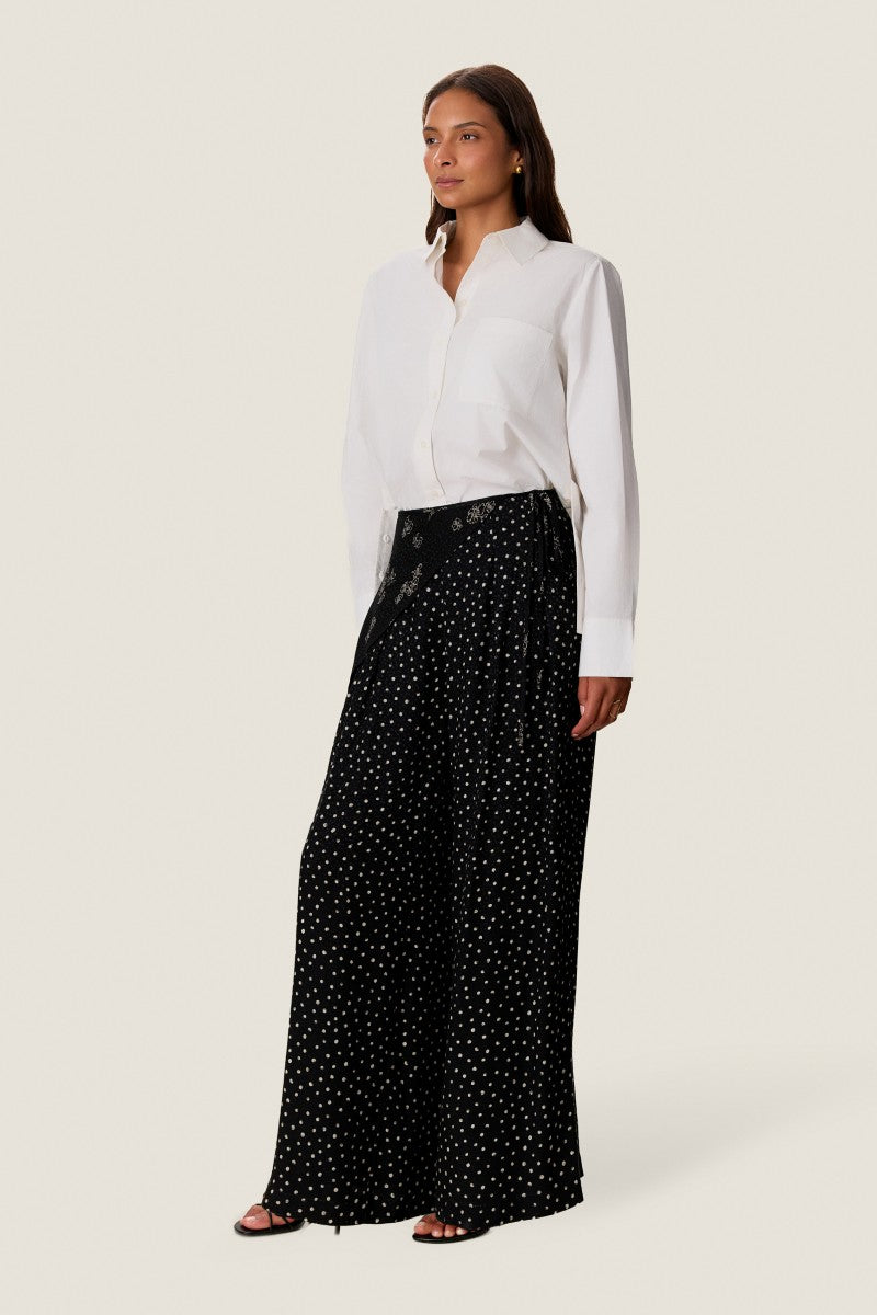 Rebecca Taylor Lauren wrap pants in neutral fabric featuring a high waist, relaxed fit, and stylish wrap design.