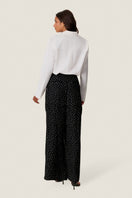 Rebecca Taylor Lauren wrap pants in a soft, flowing fabric with a high waist and wide leg silhouette, shown on a model.