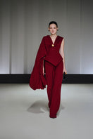 Jenny K Tran Adlington top displayed on a hanger, showcasing its stylish design and fabric details.