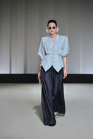 Jenny K Tran Longtown blazer in tailored black fabric, featuring a classic lapel collar and sleek fit.
