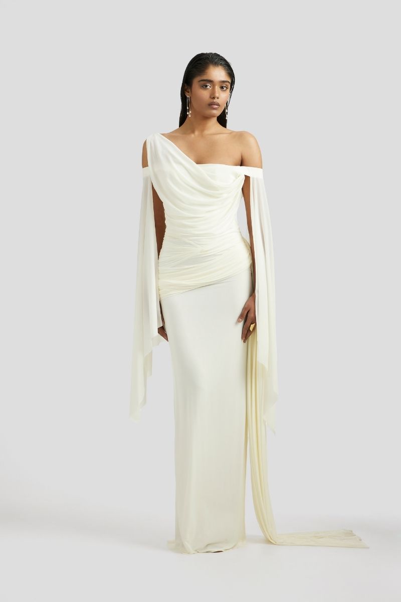 Deme By Gabriella Cynthia maxi dress in butter yellow with flowing fabric and sleeveless design, perfect for summer occasions.