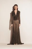 Black Valenciani mermaid mesh maxi dress with fitted silhouette and flowing fabric, perfect for elegant occasions.