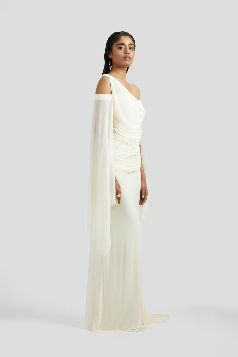 Deme By Gabriella Cynthia maxi dress in butter yellow, flowing fabric, sleeveless design, and elegant length for summer wear.