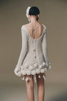 Keira Tong sculpted rose mini dress featuring a fitted silhouette and floral design, perfect for stylish occasions.