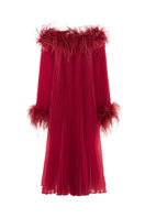 Red Valenciani midi dress with ostrich feather trim and pleated design, shown on a hanger.