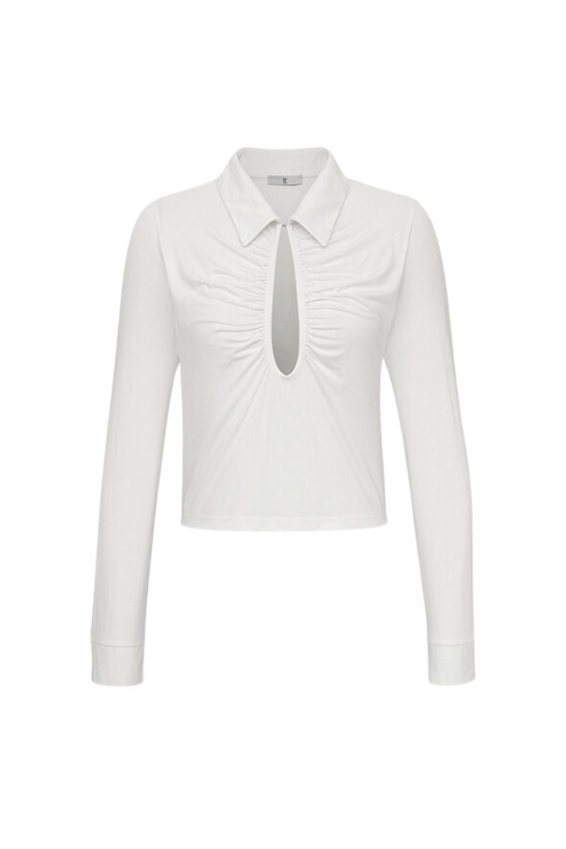 White GAB top by TT Studios, featuring a stylish, fitted design with soft fabric and a round neckline.
