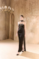Elegant navy blue renta gown by Arti Apparel, featuring intricate embroidery and flowing fabric for formal occasions.