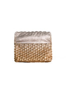 Silver and gold seashell clutch by VERDI, showcasing a stylish, textured clutch bag with metallic finish and intricate shell design.